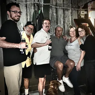 a group of people and a dog