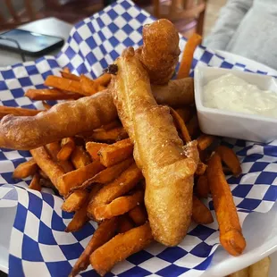 Fish and chips with sweet potato fries. Tartar sauce was delicious