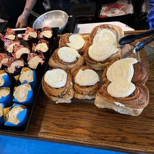 cupcakes &amp; cinnamon rolls with cream cheese frosting