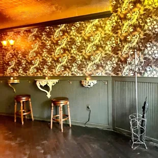 a bar with wooden stools