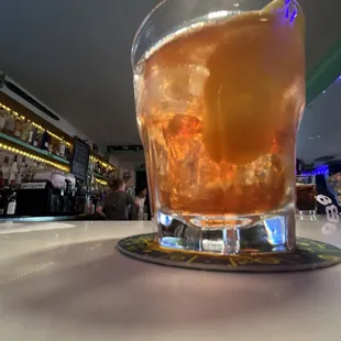 a drink in a tall glass