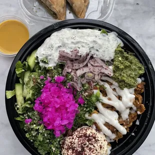 $10 - beautiful and delicious chicken shawarma bowl.