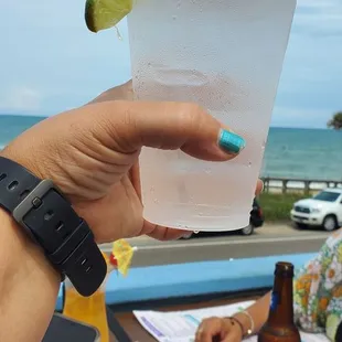 a person holding a drink