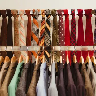 A selection of men's ties and blazers.