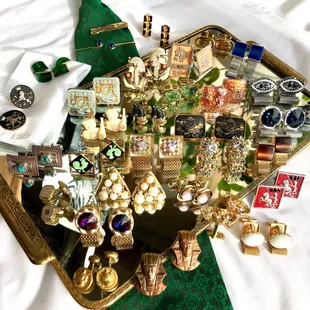 An eclectic assortment of cufflinks.