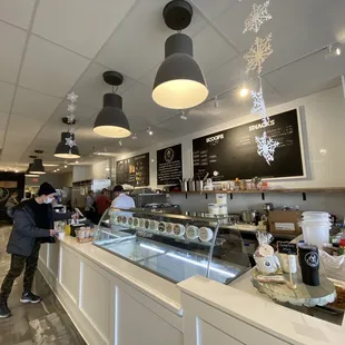 a man standing in front of a counter
