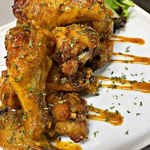 a plate of chicken wings