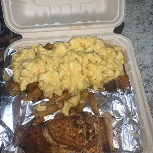 Salmon dinner w/ seafood Mac on fries