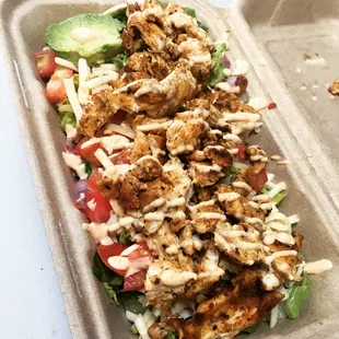 a chicken salad in a styrofoam container