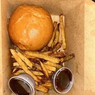 BIG DADDY HUCKLEBERRY WITH BACON AND BBQ SAUCE WITH BBQ SAUCE ON THE SIDE. COOKED TO PERFECTION!