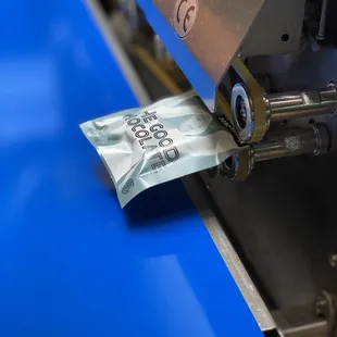 Sealing our custom made chocolates