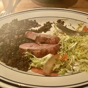 Duck with lentils and pickled carrots