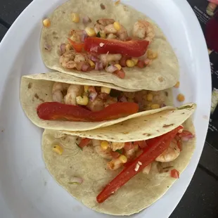 three tacos on a plate