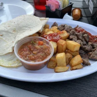 Steak and eggs - Delicious 10/10.  Salsa is bangin!