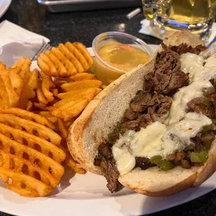 Cheesy Philly with waffle fries