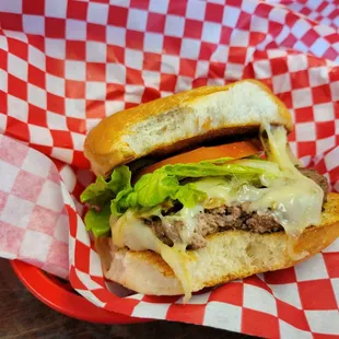 a cheeseburger in a basket