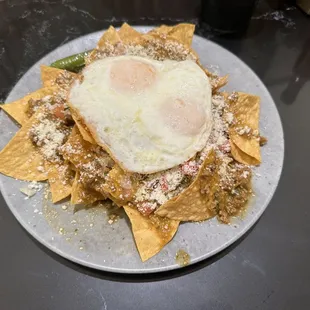 Chillaquilles Verde. Looked like breakfast nachos vs the usual, but tasted good.