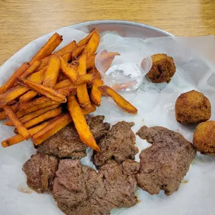 Sirloin tips, sweet potato fries, powdered sugar, and hushpuppies!