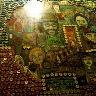 Art on the entryway staircase.