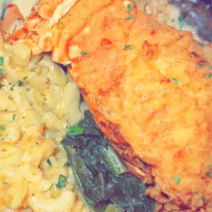 Surf &amp; Turf: Ribeye, crab on top of steak, fried lobster tail, turkey collards &amp; krack n cheese.