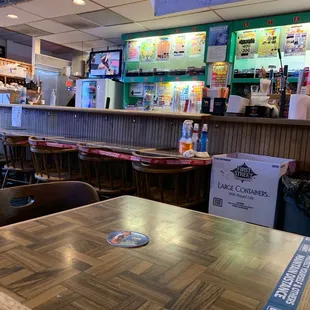 a wooden table and chairs