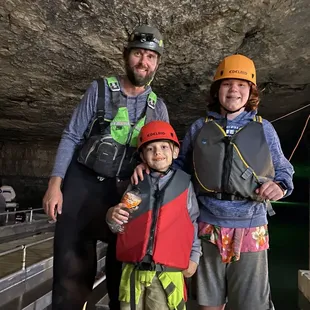 Grandsons posing with our boat tour guide.