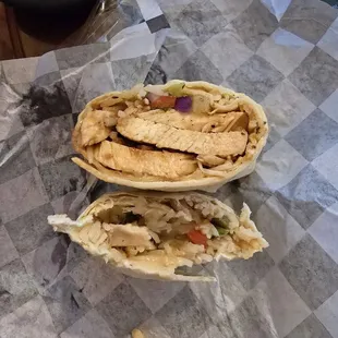 Jamaican Jerk Chicken Wrap: red beans &amp; rice, pineapple salsa topped with Jamaican jerk sauce, garlic wrap