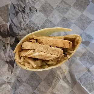 Jamaican Jerk Chicken Wrap: red beans &amp; rice, pineapple salsa topped with Jamaican jerk sauce, garlic wrap