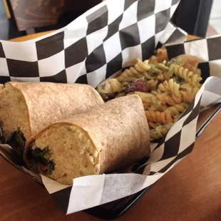 Traditional chicken salad on wheat wrap with tropical chicken pasta salad.