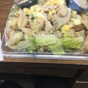 Blackened chicken Cesar salad with added chopped egg