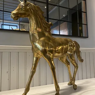 Gold horse