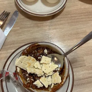 a bowl of oatmeal with banana slices