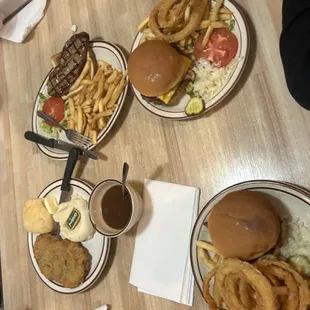 three plates of food on a table
