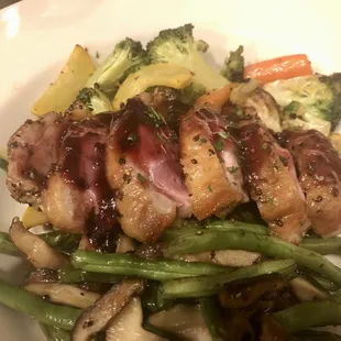 Duck. Cooked to the right Med rare temp. Veggies were good. Duck skin could be crispier