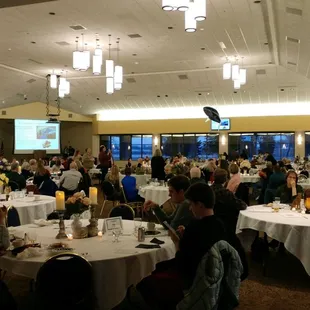 Large area for live and silent auction tables along with dining area.