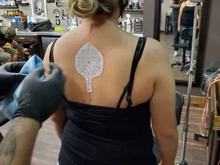 Dapper Ink Tattoo