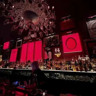 a woman sitting at a bar