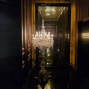 Lobby to elevator for bar and salon