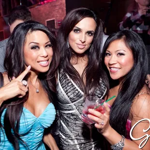 three women posing for a picture