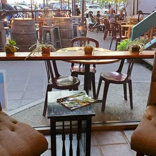 two chairs and a table in front of a window