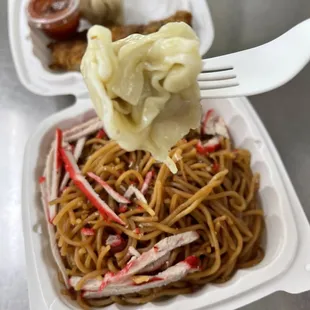 a fork picking up some noodles