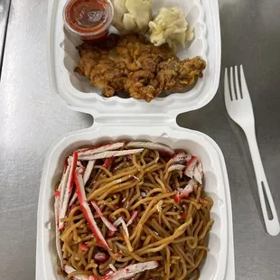 a meal in a styrofoam container