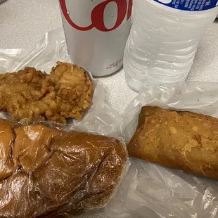 All for $7.25! Chicken (taste like mochiko) , fried burrito, hot dog manapua, Diet Coke, and a bottled water from Lanh Wagon.