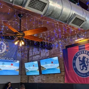 a ceiling fan with blue lights