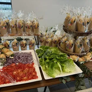 Charcuterie cups and toppings for the sandwiches