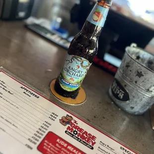 a bottle of beer on a table