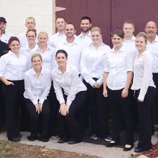 a group of people posing for a picture