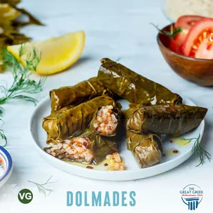 DOLMADES
Stuffed Grape Leaves with Rice and Fresh Herbs. Served Chilled
(Vegetarian)