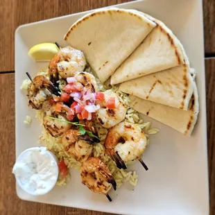 Shrimp Souvlaki with rice, pita, and tzatziki
