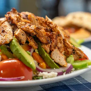 a salad with chicken and vegetables